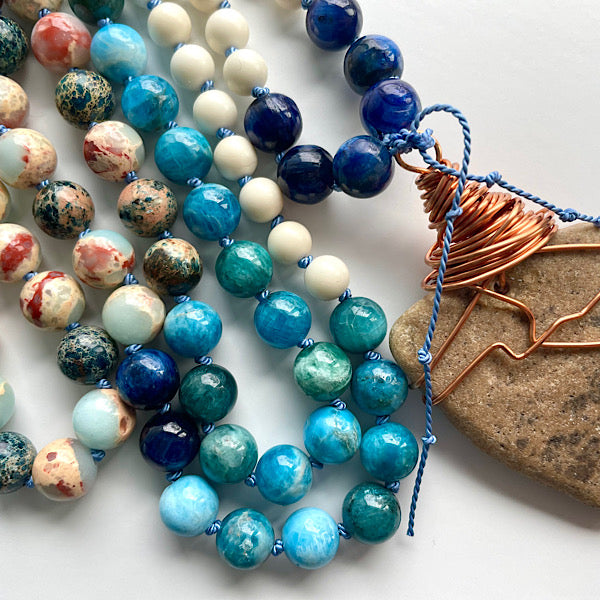 long earthy blue and white beaded, copper wire wrapped sea stone pendant necklace