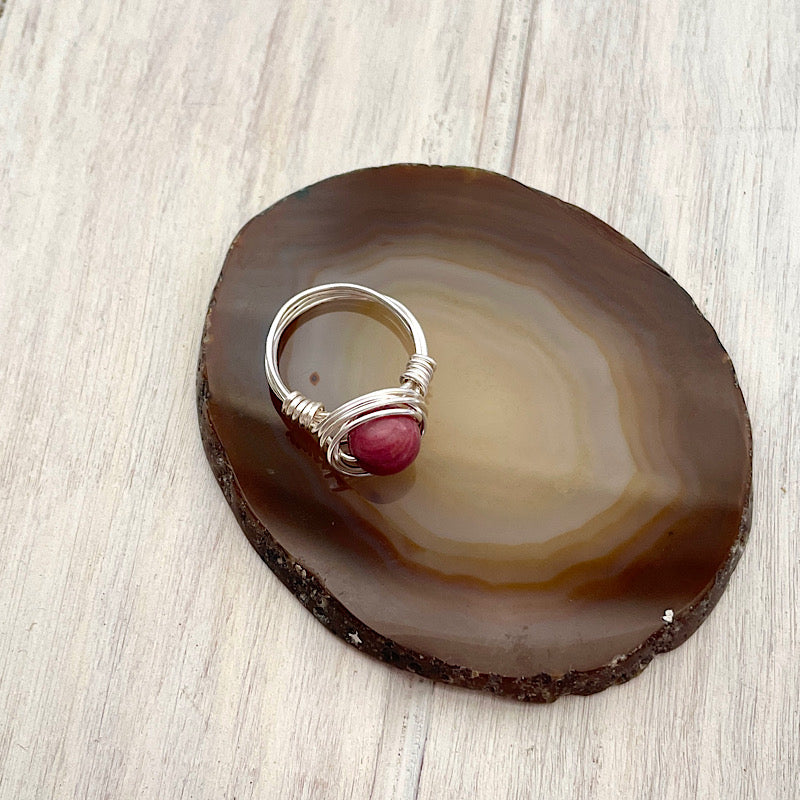 silver and pink swirl set ring
