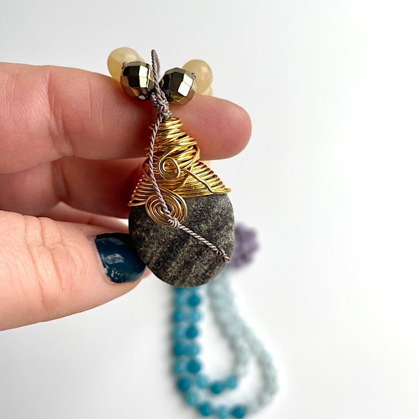 closeup of the wire wrapped sea rock pendant